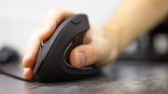 Close-up of an ergonomic computer mouse.